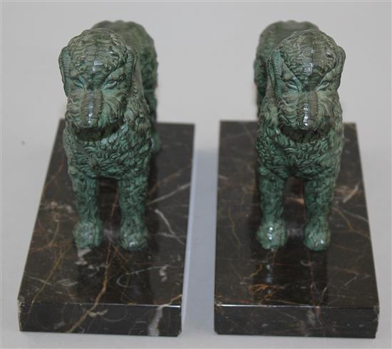 A pair of French Art Deco patinated metal bookends, modelled as poodles, 6in.